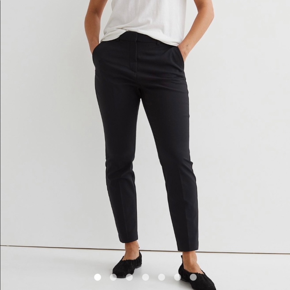 H&M slacks in the color beige plaid.